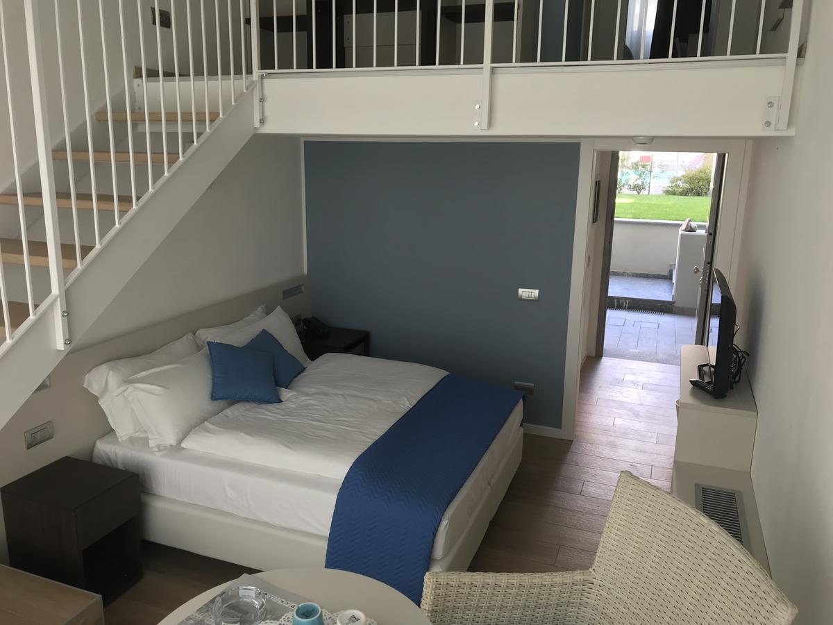 Hotel Vischi Домасо Екстериор снимка